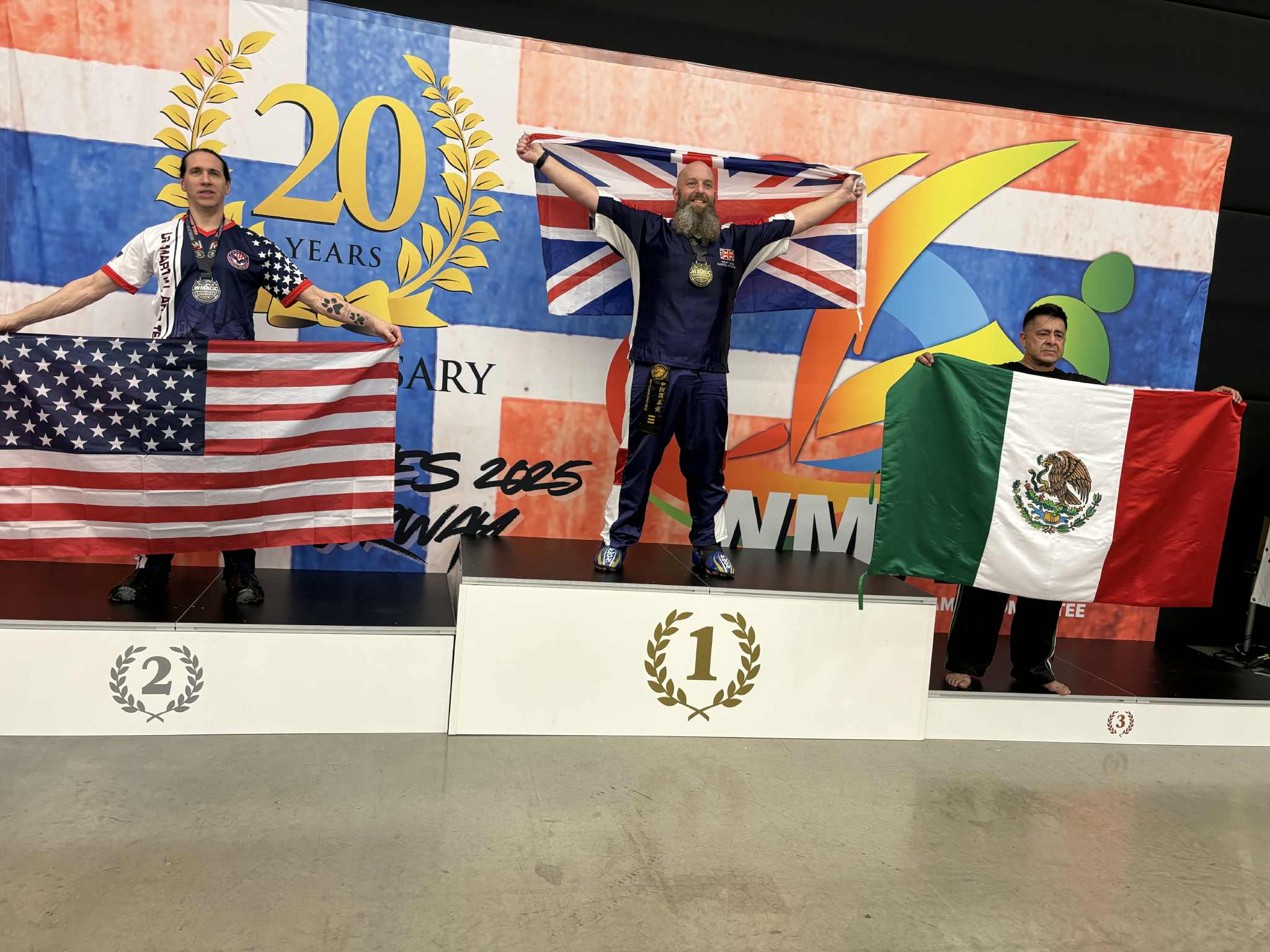 Sifu Daniel Cooke on the podium representing Team GB